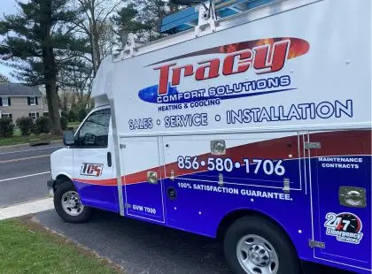 Tracy Comfort Solutions HVAC Truck at a client